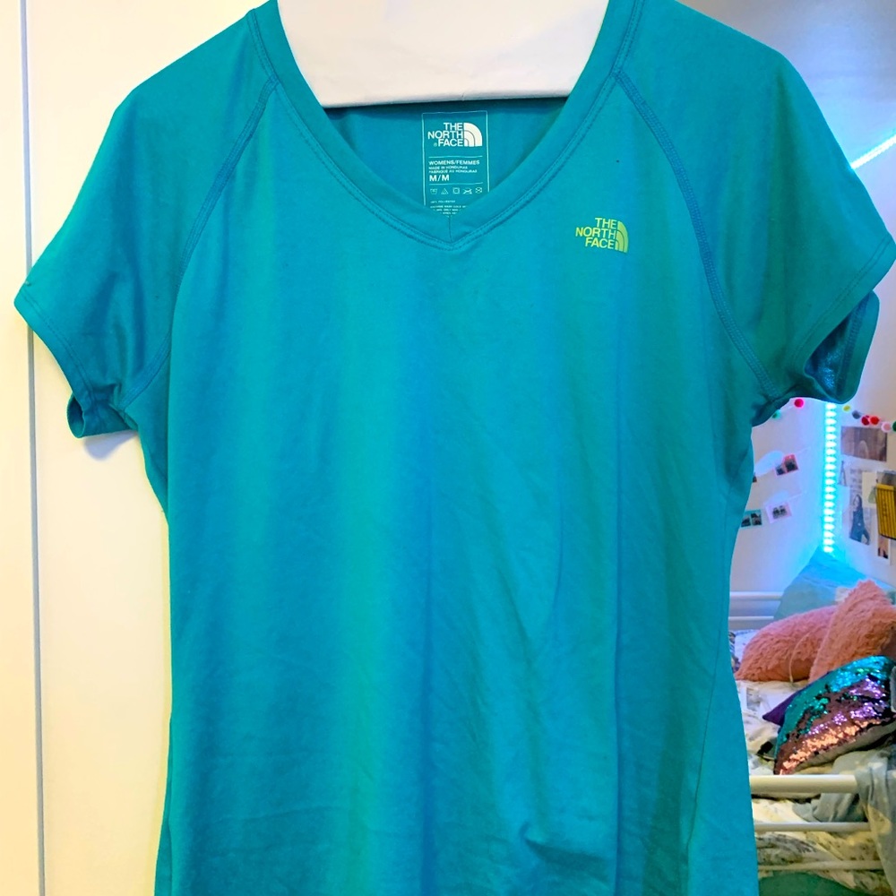 teal athletic top